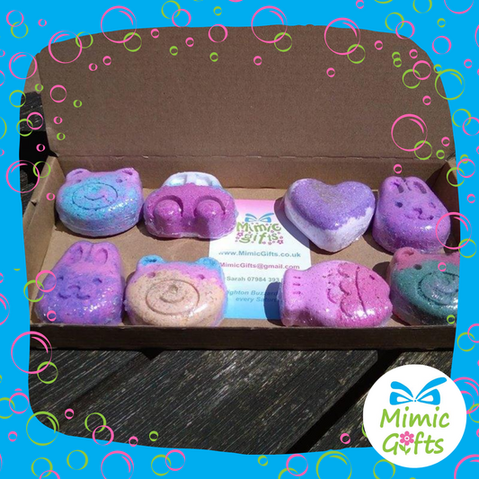 Set of 8 mini bath bombs in a postage box