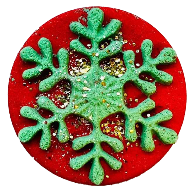 Christmas snowflake Bath Bomb in red emblazzed with festive green snowflake & biodegradable glitter