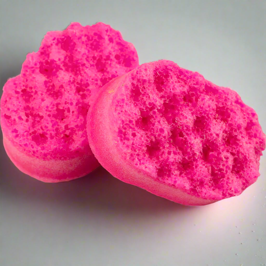 Travel sized sponge infused with pink soap