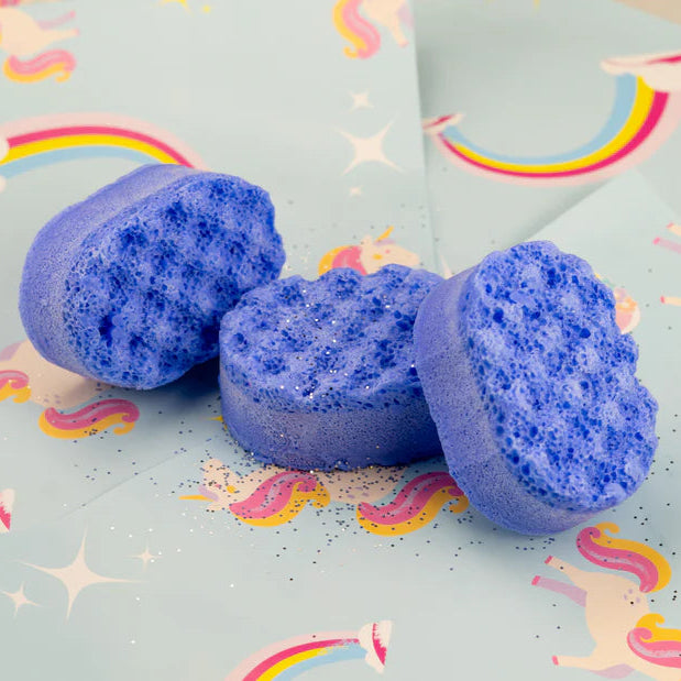 Three purple sponges infused with soap