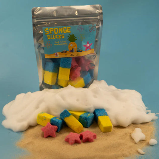 A pack of Blue & Yellow bath bombs, with a pineapple & tropical beach scene on the label